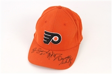 2000s Dave Schultz Larry Goodenough Bob Kelly Philadelphia Flyers Signed Cap (JSA)