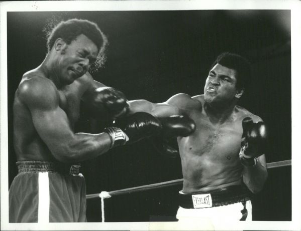 1975 Muhammad Ali Hits George Foreman "Rogers Photo Archive" Original 7" x 9" Photo (MEARS Photo LOA)