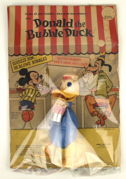 1950s Morris Plastic Corp. Donald Duck Bubble Squeeze Toy Walt Disney MIP with full graphic header card