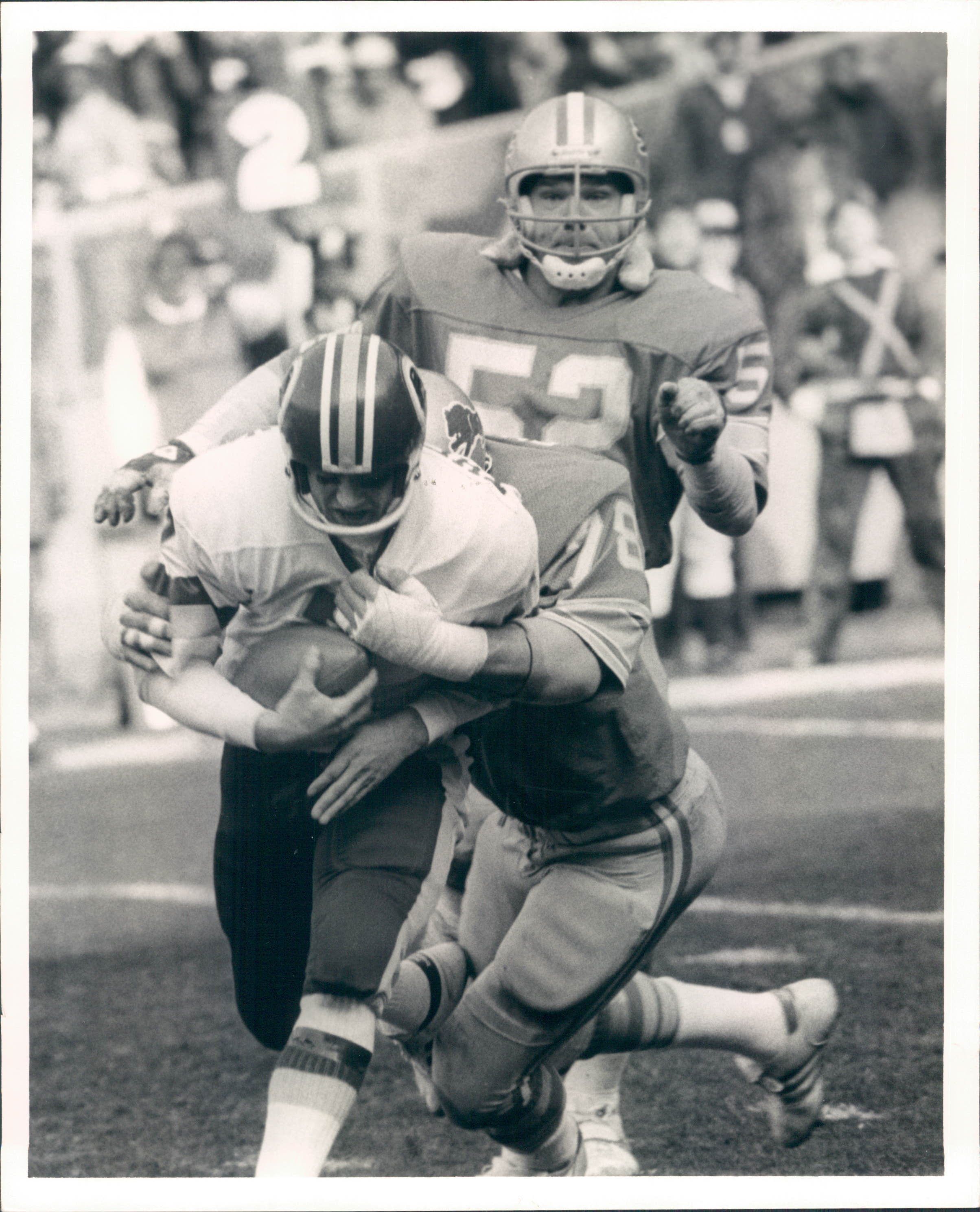 Washington Redskins running back John Riggins (44) looks to happy teammate  Art Monk after running for the Skins third touchdown of their game with the  New York Giants in East Rutherford, N.J.