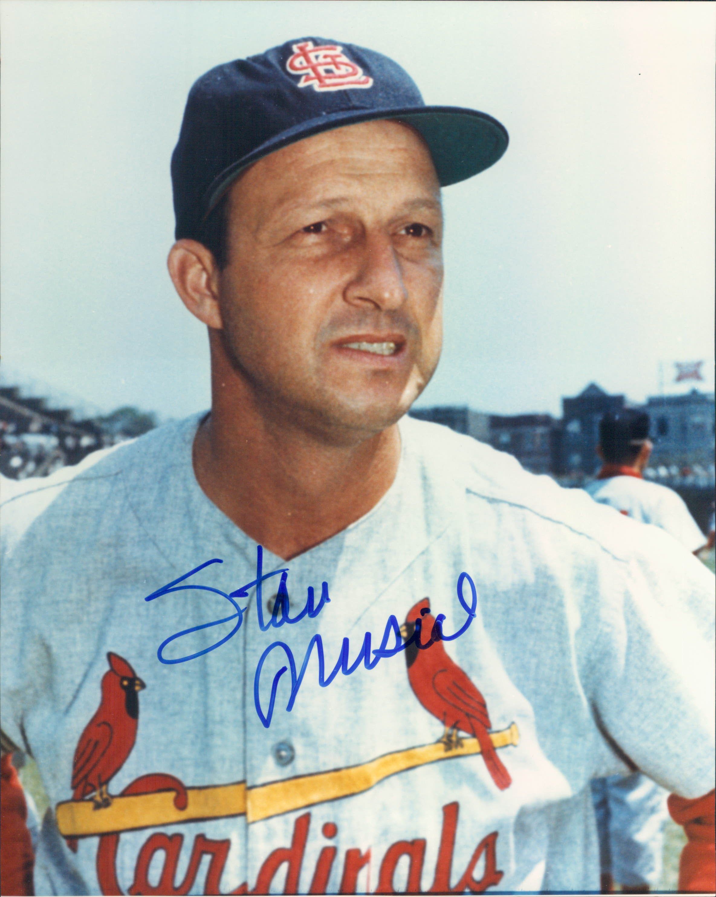 3. Stan Musial graciously signed these 8" x 10" photos in blue fe...