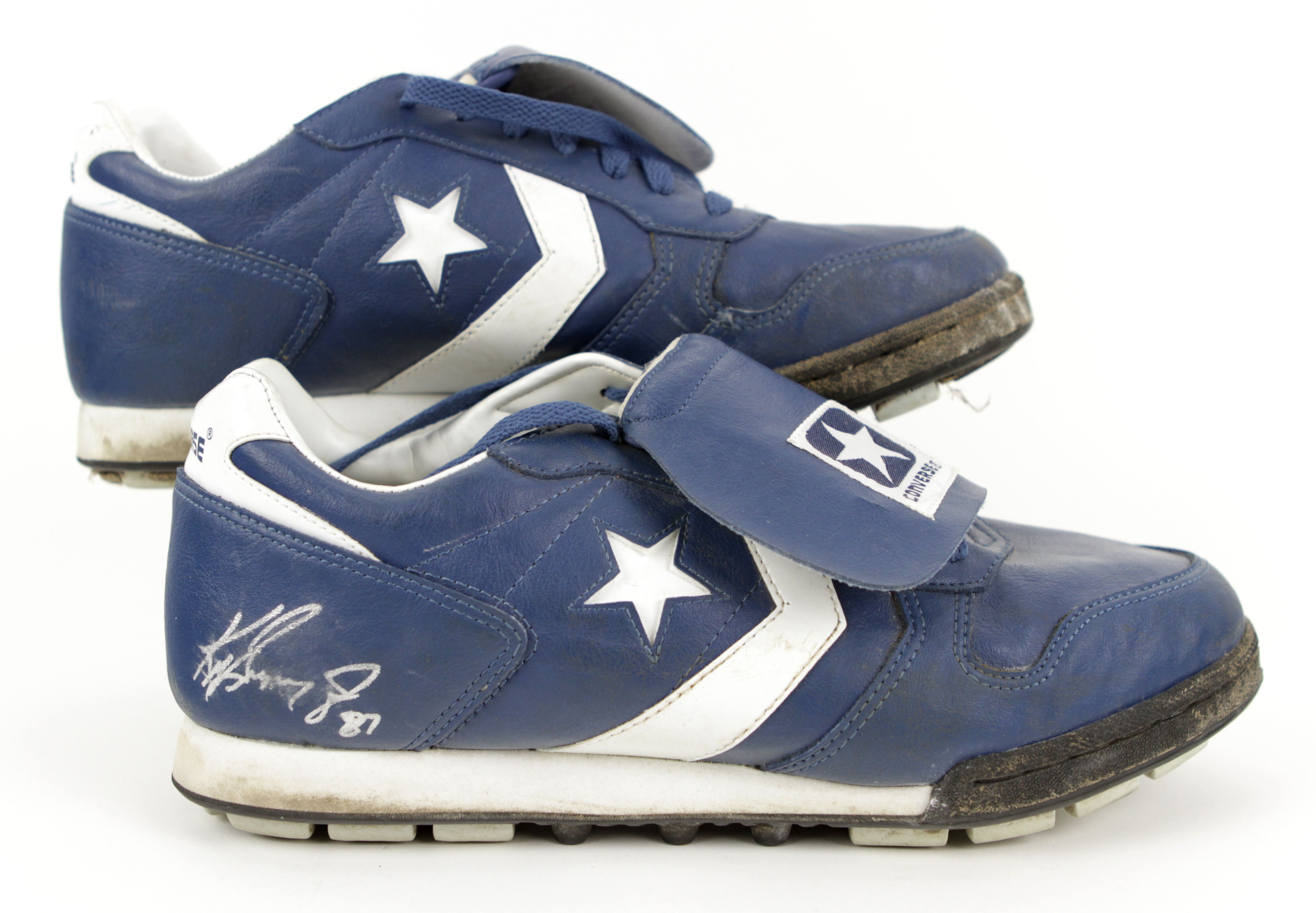 Ken Griffey, Jr. Game Used Cleats and Batting Glove.  (Total: 2