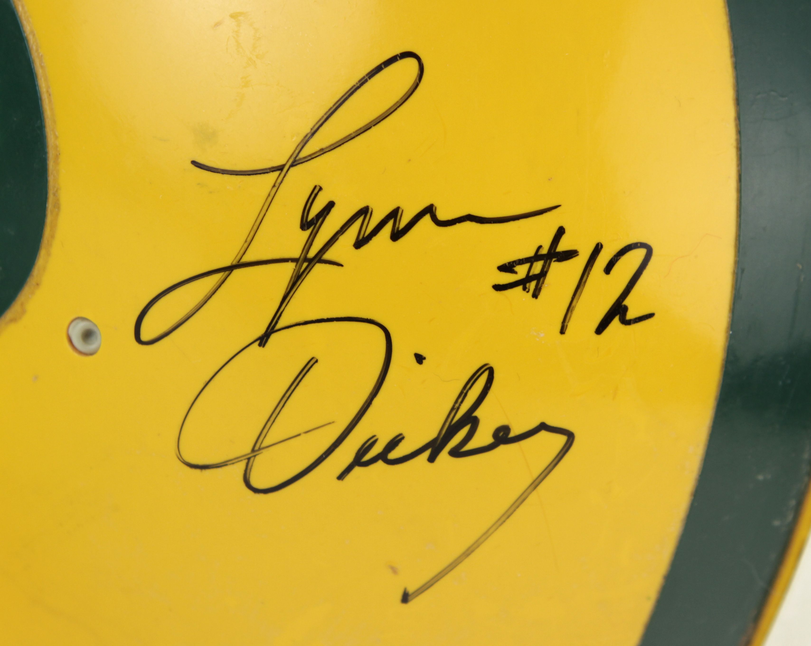 london, uk, 09.09.2022 official NFL Green Bay Packers mini helmet signed by  LYNN DICKEY #12 linebacker. Retro vintage sports players and merchandise.  American football fans. Stock Photo