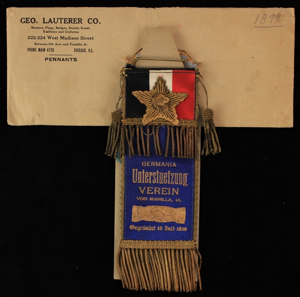 1899 Germania Unterstuetzung Verein Von Manilla, IA Tassled 7" Ribbon w/ Original Geo. Lauterer Co. Envelope