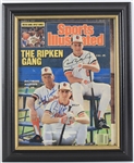 1987 Cal Ripken Jr./Sr. Billy Ripken Baltimore Orioles Signed 11" x 13" Framed Sports Illustrated Cover Page (JSA)
