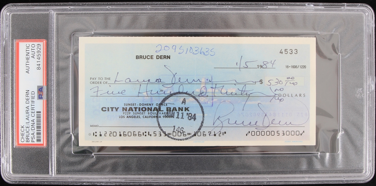 1984 Bruce and Laura Dern Signed and Endorsed Check (PSA Slabbed)