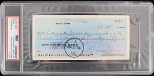 1984 Bruce and Laura Dern Signed and Endorsed Check (PSA Slabbed)