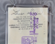 1984 Bruce and Laura Dern Signed and Endorsed Check (PSA Slabbed)