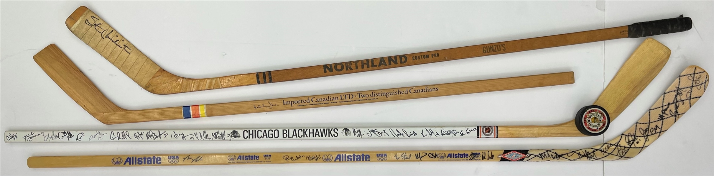 1970s-90s Signed Game Used Hockey Stick Collection - Lot of 4 w/ Stan Mikita, 1980 USA Olympic Team Reunion, Chicago Blackhawks Team Signed & More (MEARS LOA/JSA)