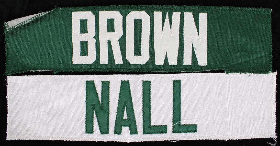 1990s-2000s Craig Nall and Brown Green Bay Packers Jersey Name Plates ( Pepper Burress Collection) (Lot of 2)