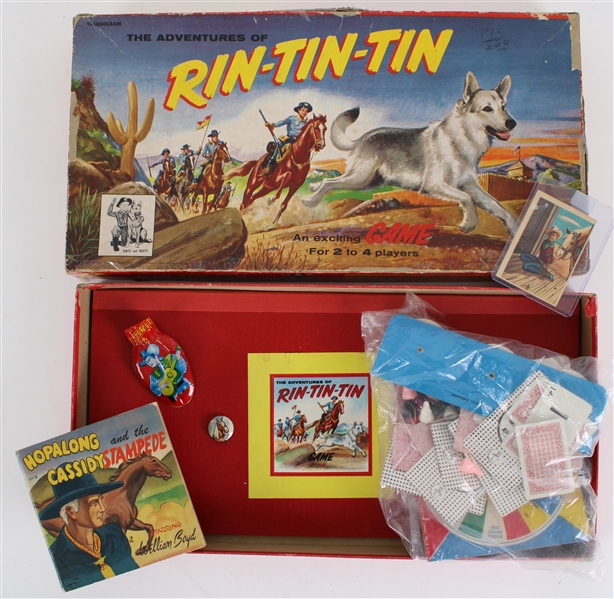1950s Vintage Cowboy Americana Memorabilia Collection - Lot of 5 w/ Adventures of Rin Tin Tin Board Game, Hopalong Cassidy Book, Roy Rogers Card, Trigger Pinback & More 